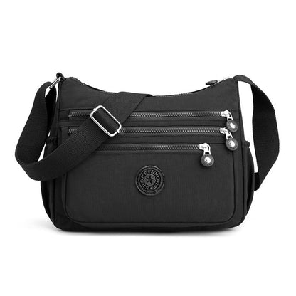 ✨ 50 % RABATT NU! ✨ Lätt nylon crossbody-väska med flera fickor – smidig, säker & perfekt för vardag & resa 🎒