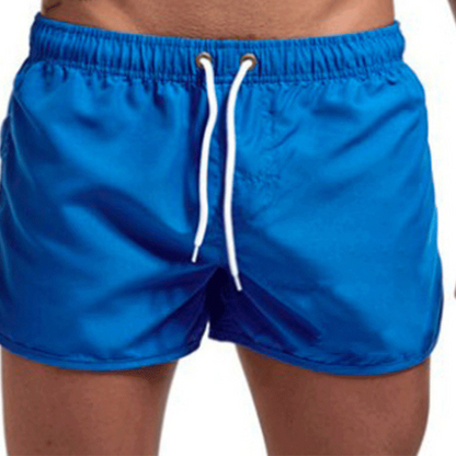 ❄️Begränsat erbjudande med 50% rabatt! 🌊 Snabbtorkande badbyxor för män - Lätta strandshorts med resår i midjan, perfekta för semester, poolen och sommarkläder.