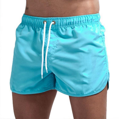 ❄️Begränsat erbjudande med 50% rabatt! 🌊 Snabbtorkande badbyxor för män - Lätta strandshorts med resår i midjan, perfekta för semester, poolen och sommarkläder.