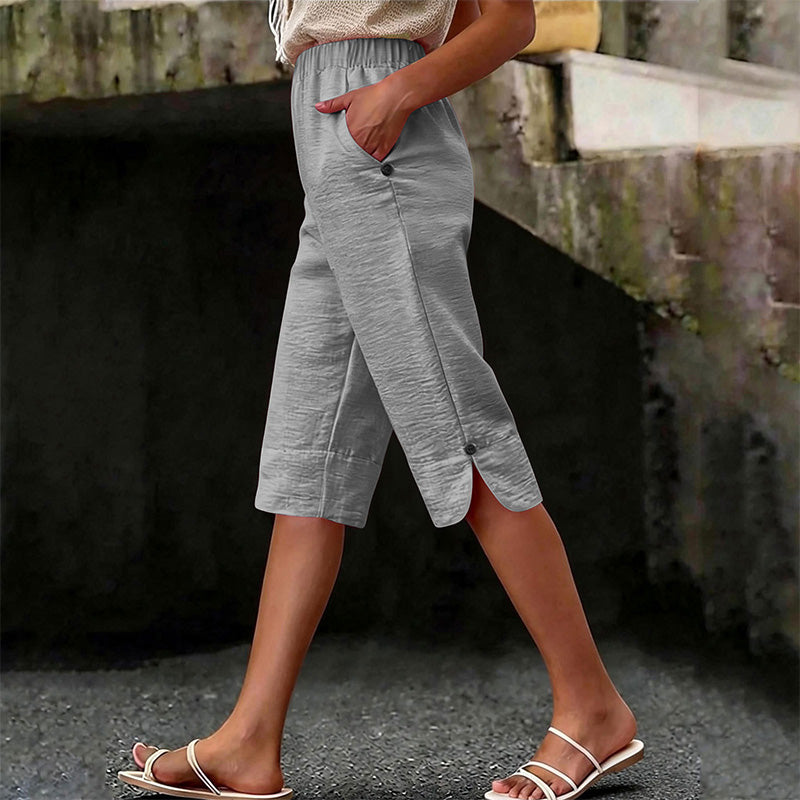 👖🌬️ Andningsbara capribyxor med resår och sidoslits