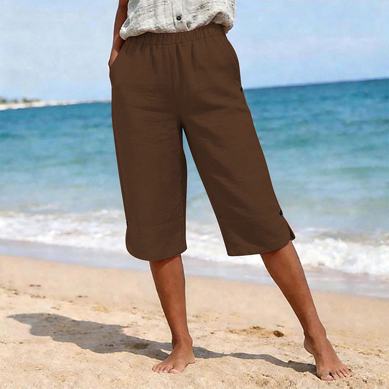 👖🌬️ Andningsbara capribyxor med resår och sidoslits