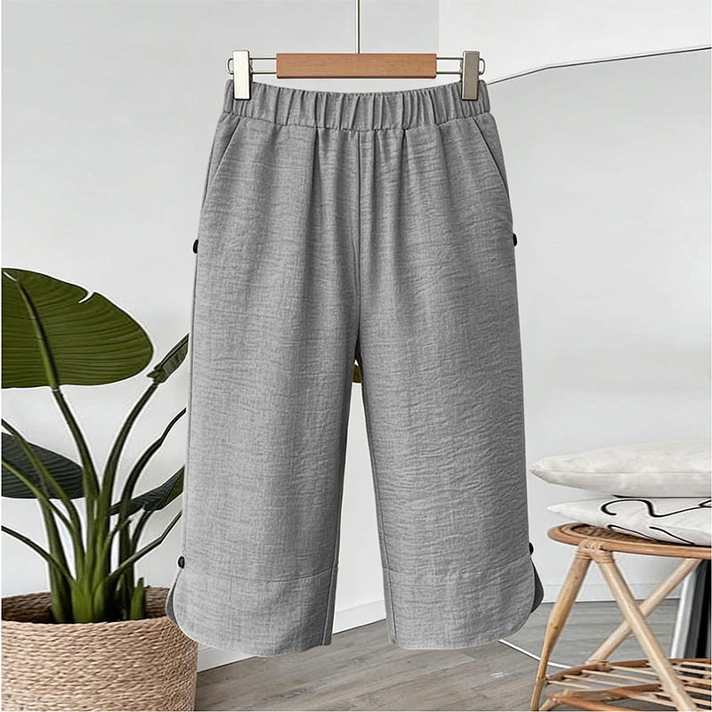 👖🌬️ Andningsbara capribyxor med resår och sidoslits