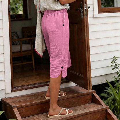 👖🌬️ Andningsbara capribyxor med resår och sidoslits