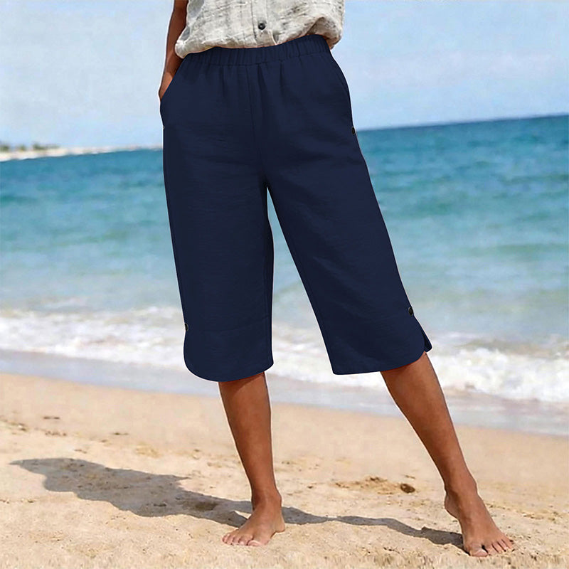👖🌬️ Andningsbara capribyxor med resår och sidoslits