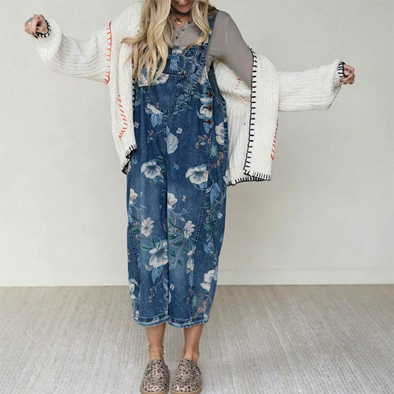 👖🌸 Denimoverall med blommönster och justerbara hängslen