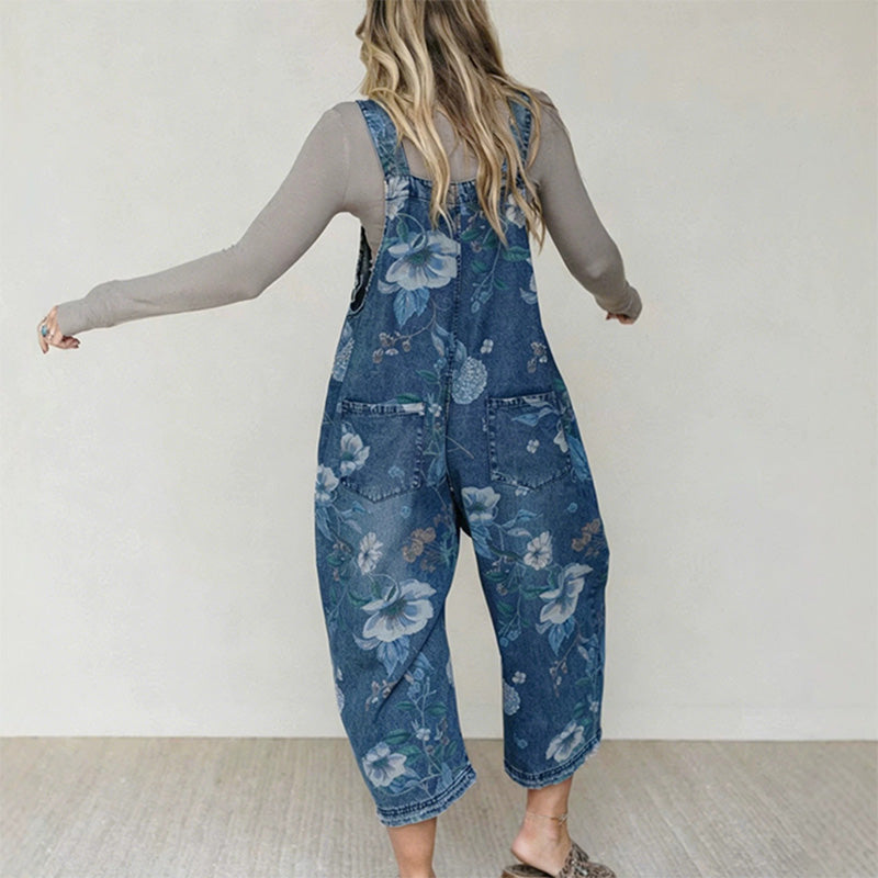 👖🌸 Denimoverall med blommönster och justerbara hängslen