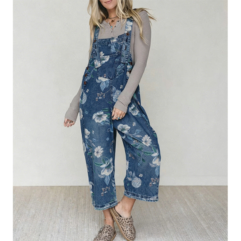 👖🌸 Denimoverall med blommönster och justerbara hängslen