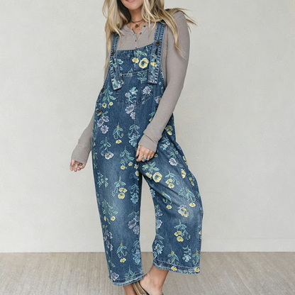 👖🌸 Denimoverall med blommönster och justerbara hängslen
