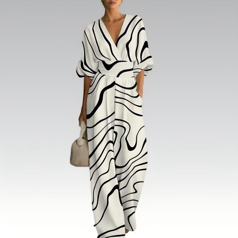 Elegant jumpsuit med V-ringning och tryck för damer