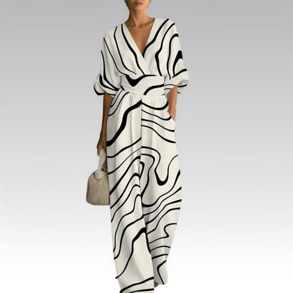 Elegant jumpsuit med V-ringning och tryck för damer