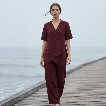 Set med asymmetrisk topp och byxor med vida ben för damer