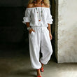 Dam axelbar jumpsuit