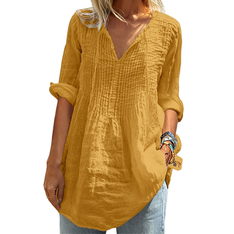 👚✨ Avslappnad blus med V-ringning och mjuk passform